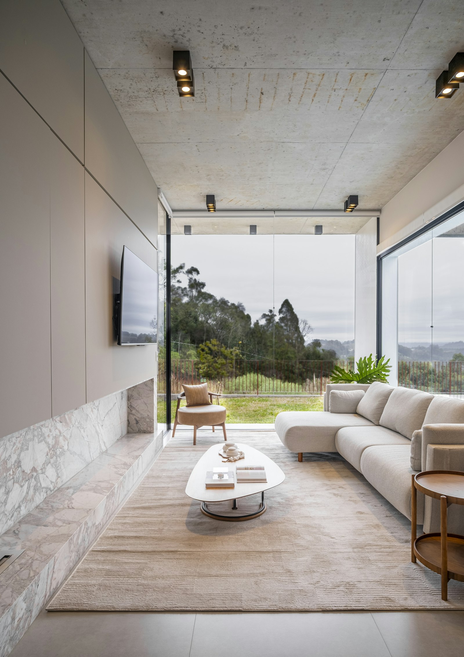 A pristine, well-kept living room with natural light