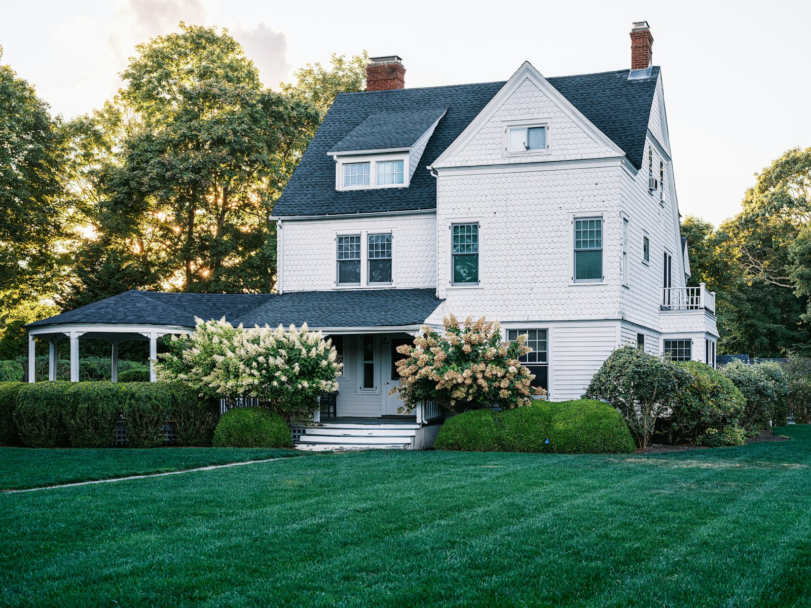 A well-kept American home with a manicured lawn, the kind of house Powerful Cleaning Services takes care of
